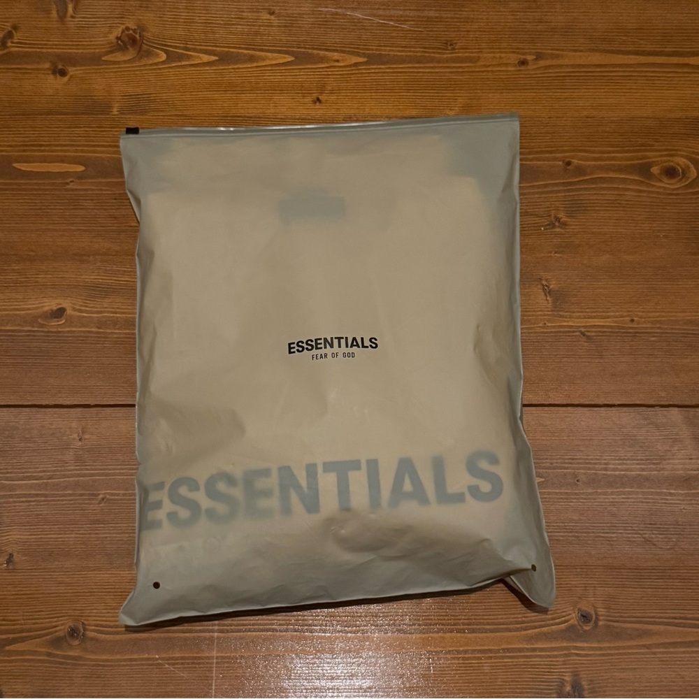 Essentials Cream Sweatshirt with Black Logo